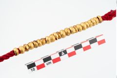 Foto von Goldperlen (NHMW-PRAE-025701)